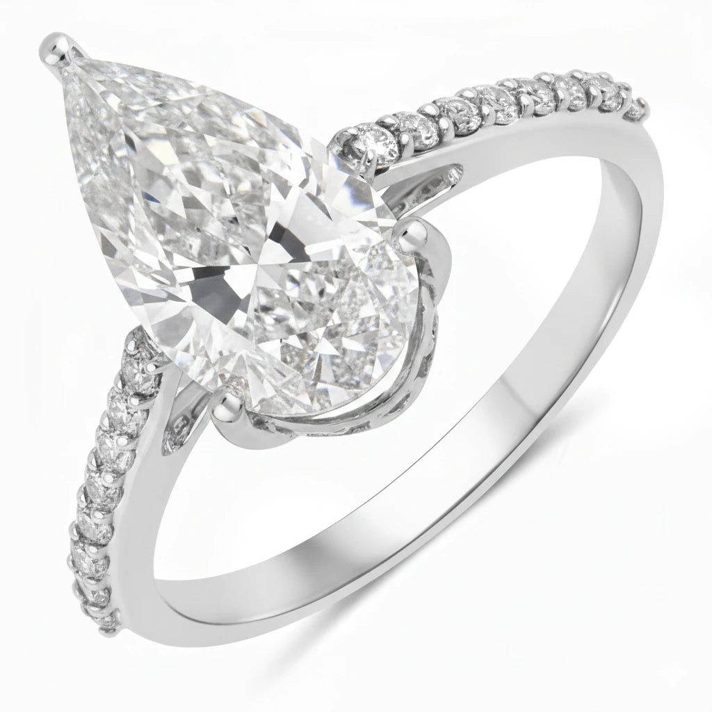 Classic Raindrop Pear Cut Diamond Accent Ring