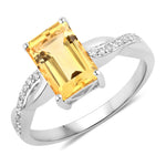 Twisted Emerald Cut Diamond Halo Ring