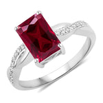 Twisted Emerald Cut Diamond Halo Ring
