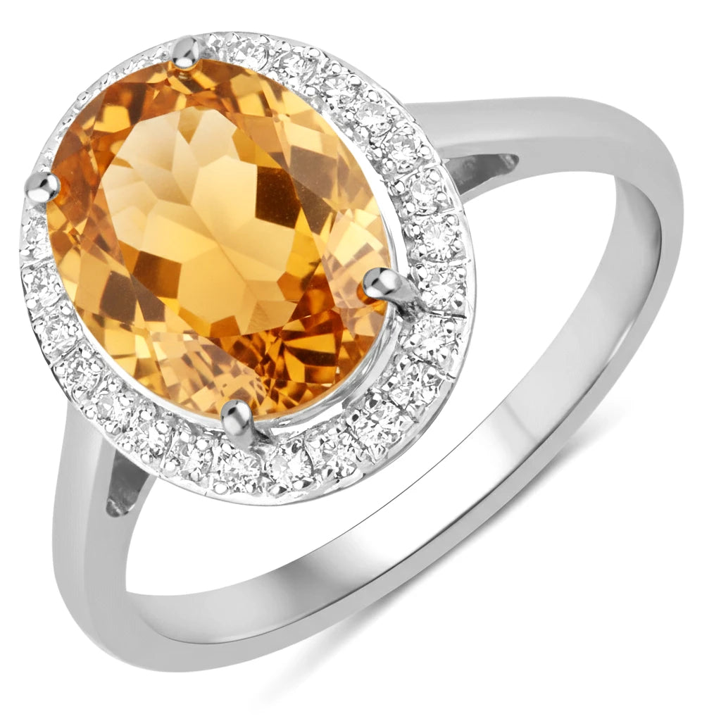 Clean Framed Oval Cut Diamond Accent Ring