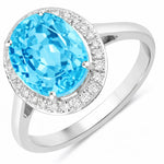 Clean Framed Oval Cut Diamond Accent Ring